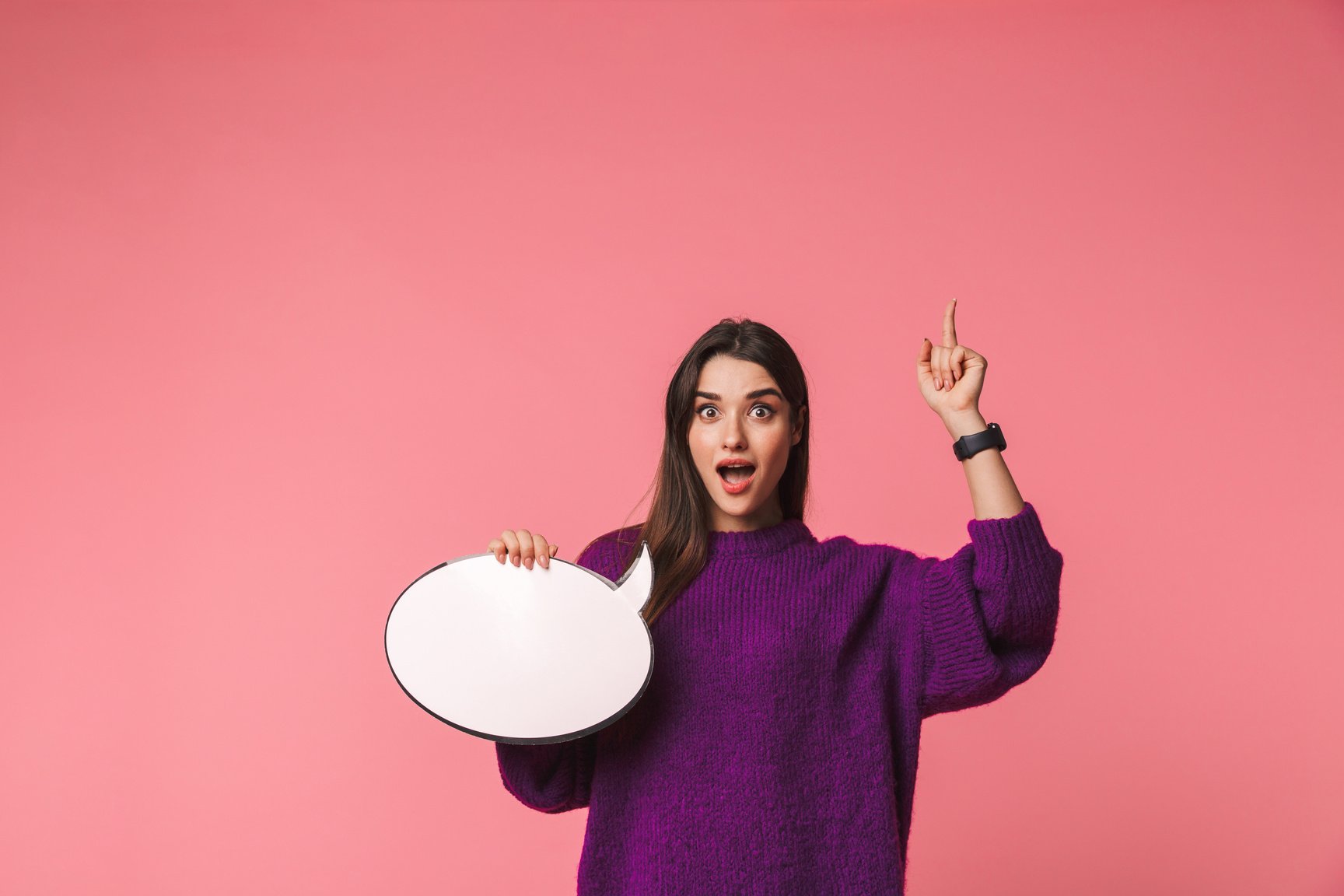 Excited Young Girl Holding Speech Bubble